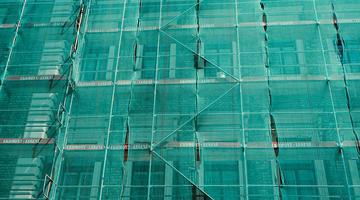 A photo of some renovation work seemingly being done on a building envelope