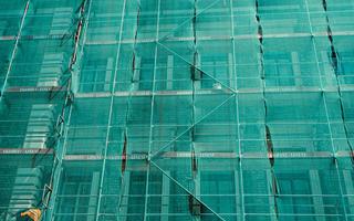 A photo of some renovation work seemingly being done on a building envelope